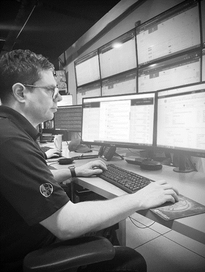 Security Analyst Looking Over Analytics